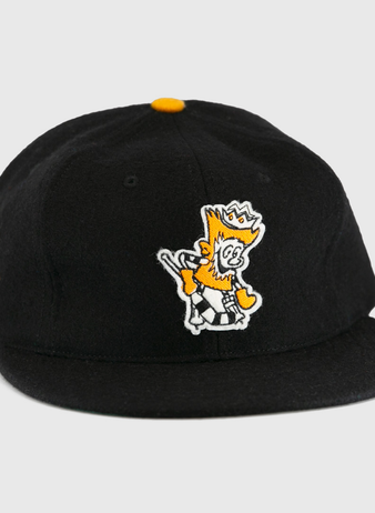 The EFF Brandon Wheat Kings 1955 Vintage Ballcap is a black wool hat inspired by classic hockey styles, featuring a yellow and white crowned cartoon lion embroidered on the front and a small yellow shield emblem.