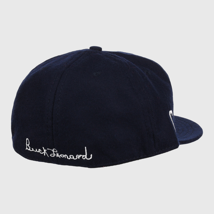 The Ebbets Field Flannels Buck Leonard Signature Series Ballcap is a navy vintage wool cap featuring white cursive Buck Leonard embroidery on the back, honoring the Negro Leagues legend.
