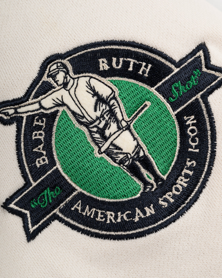 Add classic style to your EFF Babe Ruth Cotton French Terry Pullover Hoodie with this circular embroidered patch, featuring a green and black baseball player labeled Babe Ruth, American Sports Icon, on a cream background.