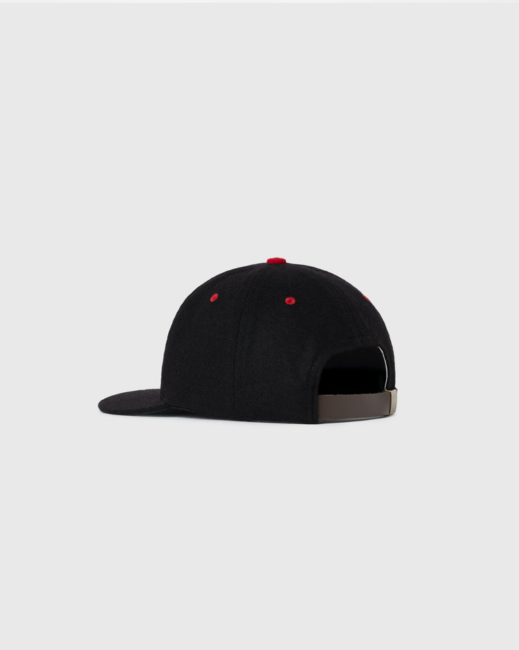 An EFF Baltimore Elite Giants 1947 Authentic Wool Ballcap in black, with a brown adjustable strap and red eyelets, is shown from the back on a light gray background—crafted to honor the Negro Leagues Baseball Museum.
