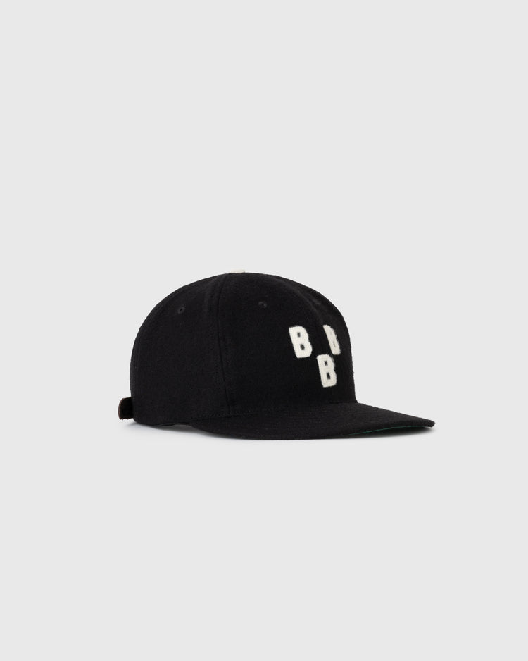 The EFF Birmingham Black Barons 1948 Authentic Wool Ballcap features a black design with white embroidered B B B on the front and a curved brim, honoring Negro Leagues history—shown against a light gray background.