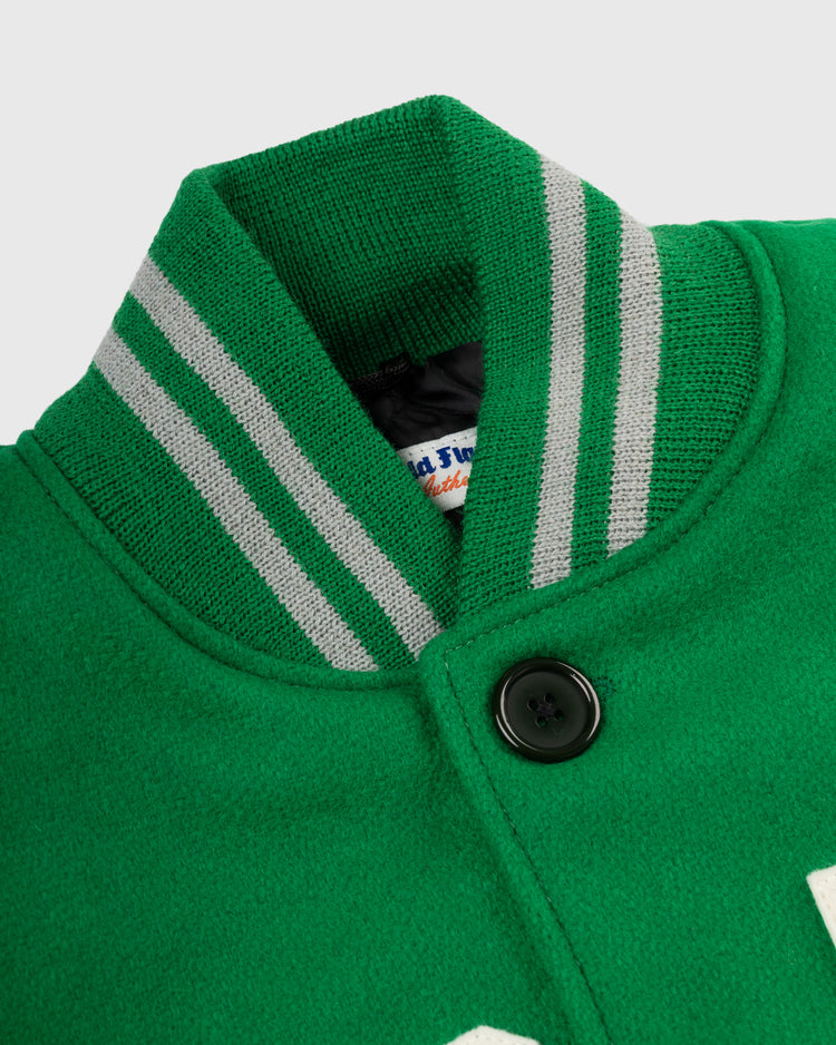 Close-up of the Brooklyn Dodgers 1937 Authentic All Wool Varsity Jacket by EFF, featuring a green body, two gray-striped ribbed collar, single black button, and partially visible inner label—an homage to the classic Ebbets Field team jacket.