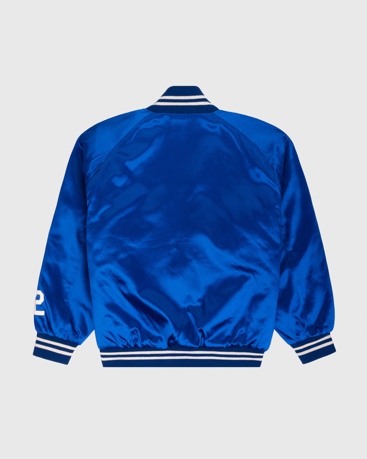 The EFF Brooklyn Dodgers 1947-50 Authentic All Satin Varsity Jacket is shown from the back in shiny royal blue with white striped ribbed cuffs, collar, and hem, and a white number 2 on the left sleeve near the cuff.