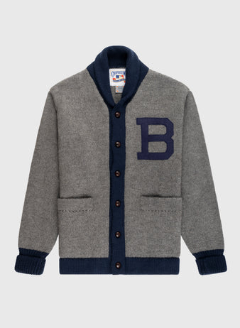 The EFF Brooklyn Robins (Dodgers) 1916 Wool Shawl Collar Sweater is a grey varsity cardigan with navy trim, navy buttons, a large navy B patch, two front pockets, and a classic shawl collar inspired by vintage baseball style.