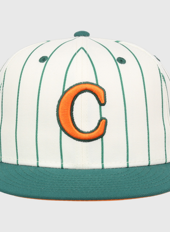 The EFF Carrots Arlington Heights Collection Pinstripe Fitted Ballcap features white fabric with green pinstripes, a green brim, and an orange C outlined in green, made in collaboration with Ebbets Field Flannels.