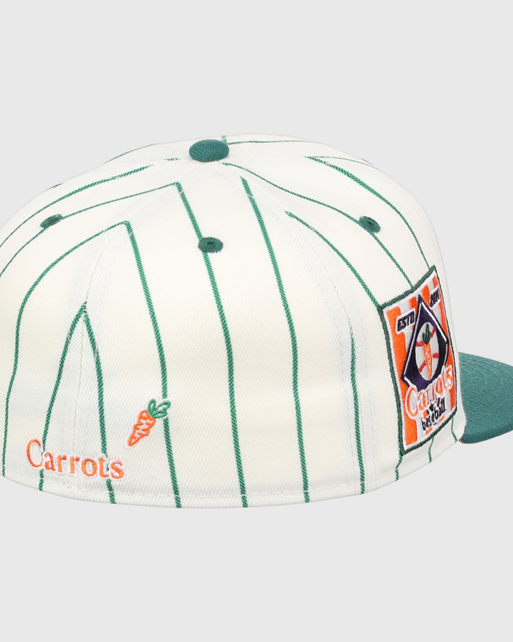The EFF Carrots Arlington Heights Collection Pinstripe Fitted Ballcap features green pinstripes and brim, an embroidered carrot, the word Carrots, and a colorful patch—highlighting its EFF x Carrots collab.