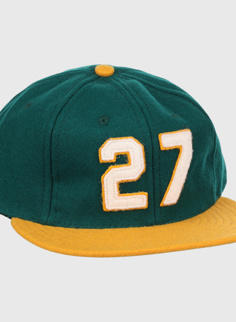 The Catfish Hunter Signature Series Ballcap by Ebbets Field Flannels is a green vintage wool cap with a yellow brim and button, featuring number 27 in white with yellow trim—an homage to National Baseball Hall of Fame legends.