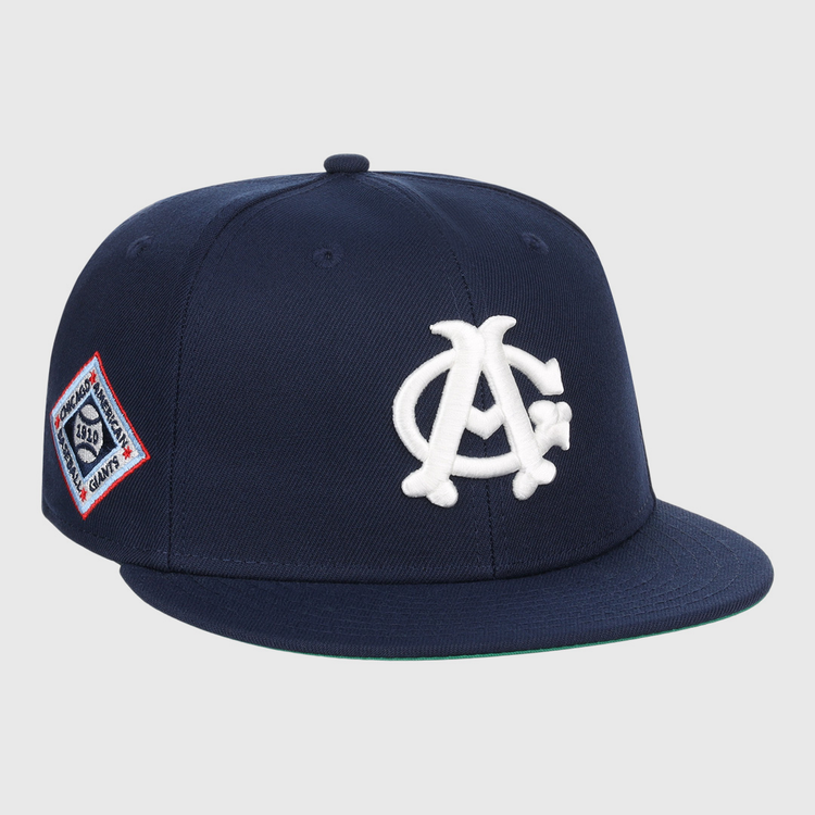 The EFF Chicago American Giants NLB Team Color Fitted Ballcap features a navy crown, flat brim, white AC logo on the front, and a red, white, and blue side patch—perfect for collectors.
