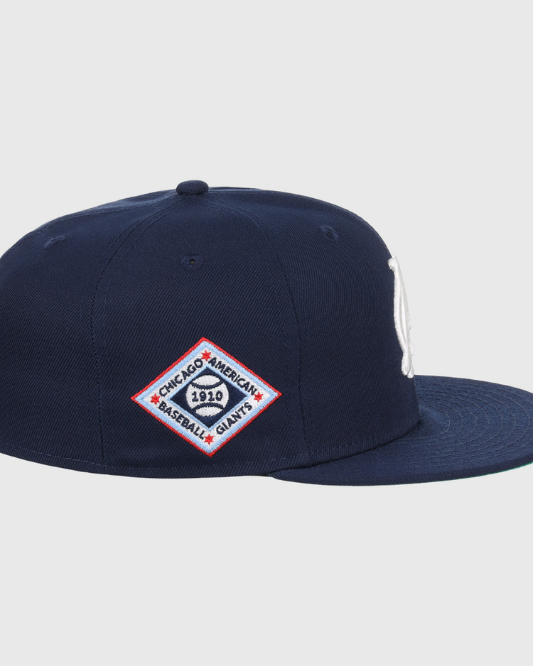 The EFF Chicago American Giants NLB Team Color Fitted Ballcap is a navy cap with a white embroidered logo, diamond patch reading Chicago Americans Baseball Giants 1920, and vintage-inspired fitted style.