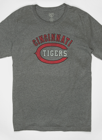 The EFF Cincinnati Tigers 1934 T-Shirt is a gray tee featuring Cincinnati Tigers in red and white letters and a large red C, honoring the legendary Negro American League team.