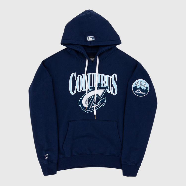 The Ebbets Field Columbus Clippers MiLB Cotton Hooded Sweatshirt is a navy blue hoodie with white drawstrings, COLUMBUS and a stylized C logo on the front, a circular 614 Class patch on the left sleeve, and a small logo near the left wrist.