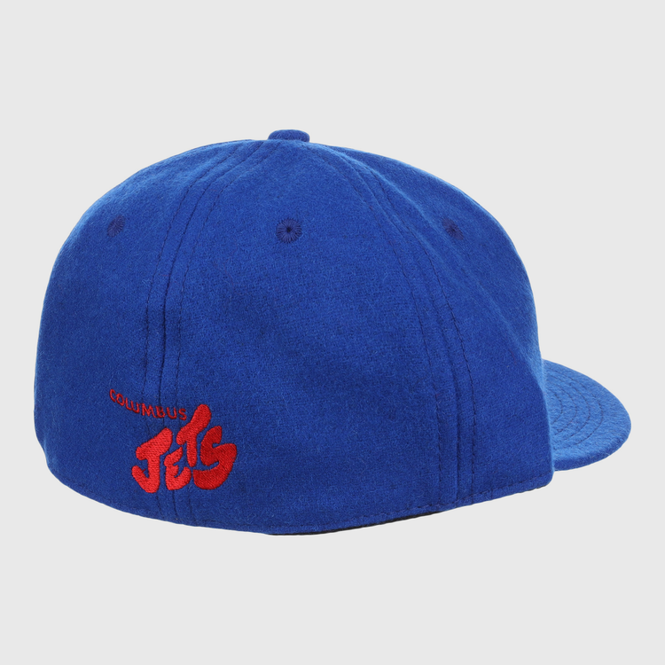 The EFF Columbus Jets Letterhead Wool Vintage Ballcap is shown from behind on a white background, featuring royal blue wool and red embroidered COLUMBUS Jets text on the back left side.