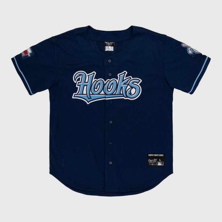 The Ebbets Field Corpus Christi Hooks MiLB Button Down Jersey features navy blue fabric, 
