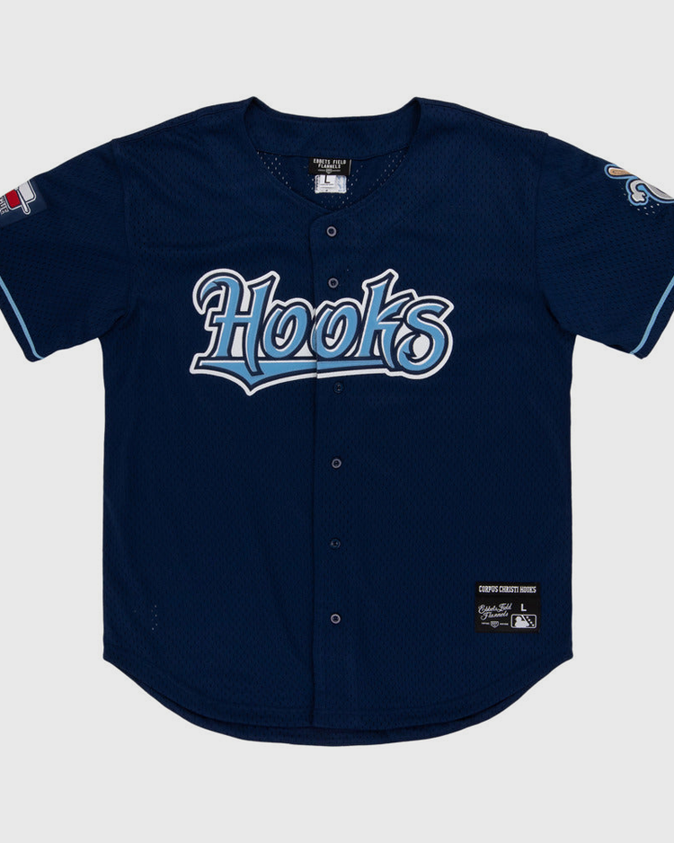 The Ebbets Field Corpus Christi Hooks MiLB Button Down Jersey features navy blue fabric, 