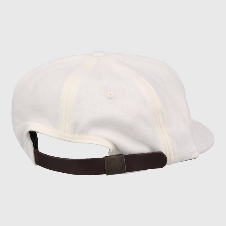 The EFF Cream Wool Vintage Ballcap is made in the USA and shown from the back, featuring a brown adjustable strap with a metal clasp.