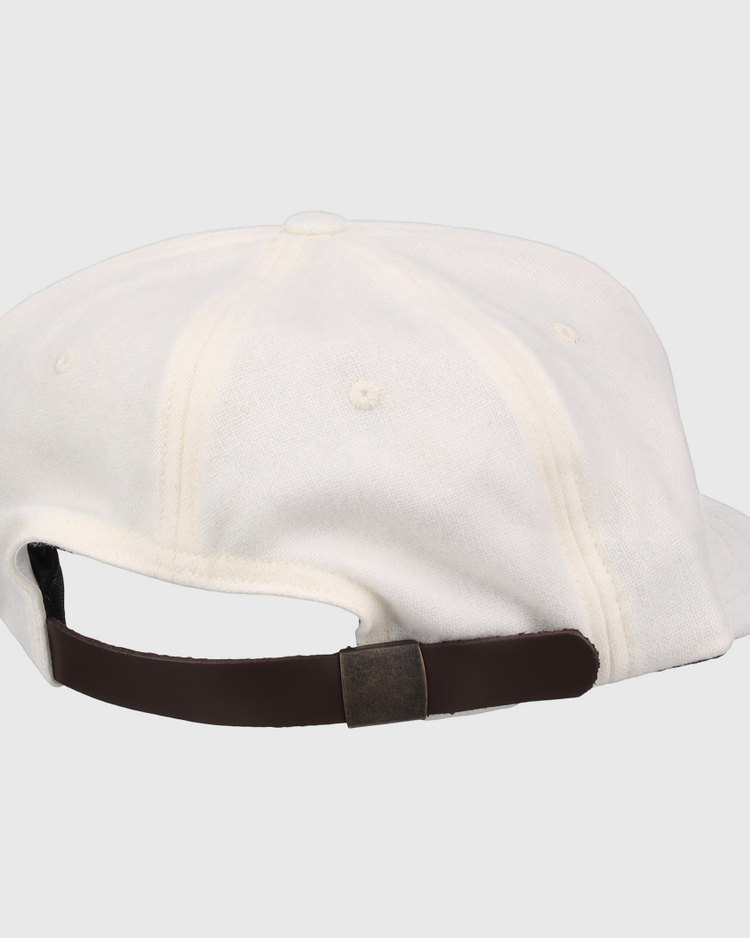 The EFF Cream Wool Vintage Ballcap is made in the USA and shown from the back, featuring a brown adjustable strap with a metal clasp.