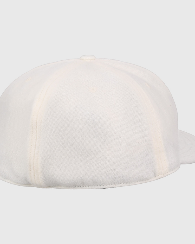 The Cream Wool Vintage Ballcap by EFF is shown from the back, highlighting its visible stitching and curved brim.
