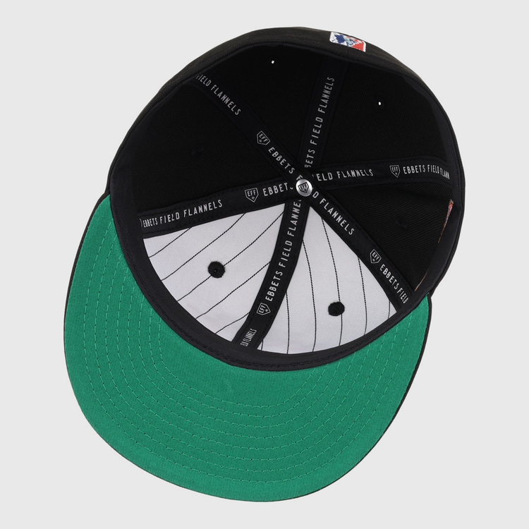 Top view of the EFF Cuban X Giants NLB Team Color Fitted Ballcap reveals green underbill, white pinstripe fabric, black panels, and EFF branding—classic details for this vintage-inspired Negro league hat.
