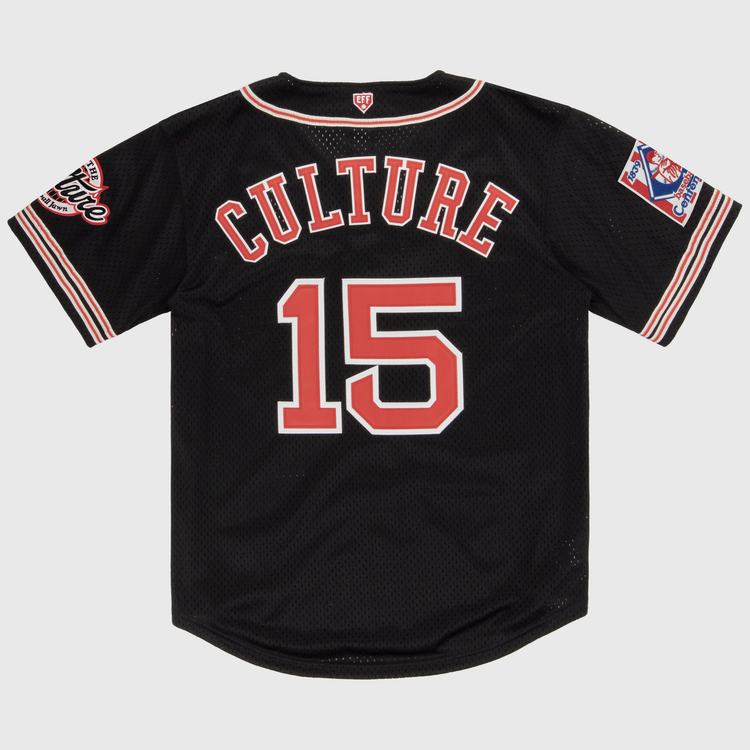 The EFF Cultural Excellence x Philadelphia Stars Button Down Jersey is a black baseball jersey with red and white trim, CULTURE and the number 15 on the back, plus sleeve patches for authentic flair inspired by Negro League streetwear.