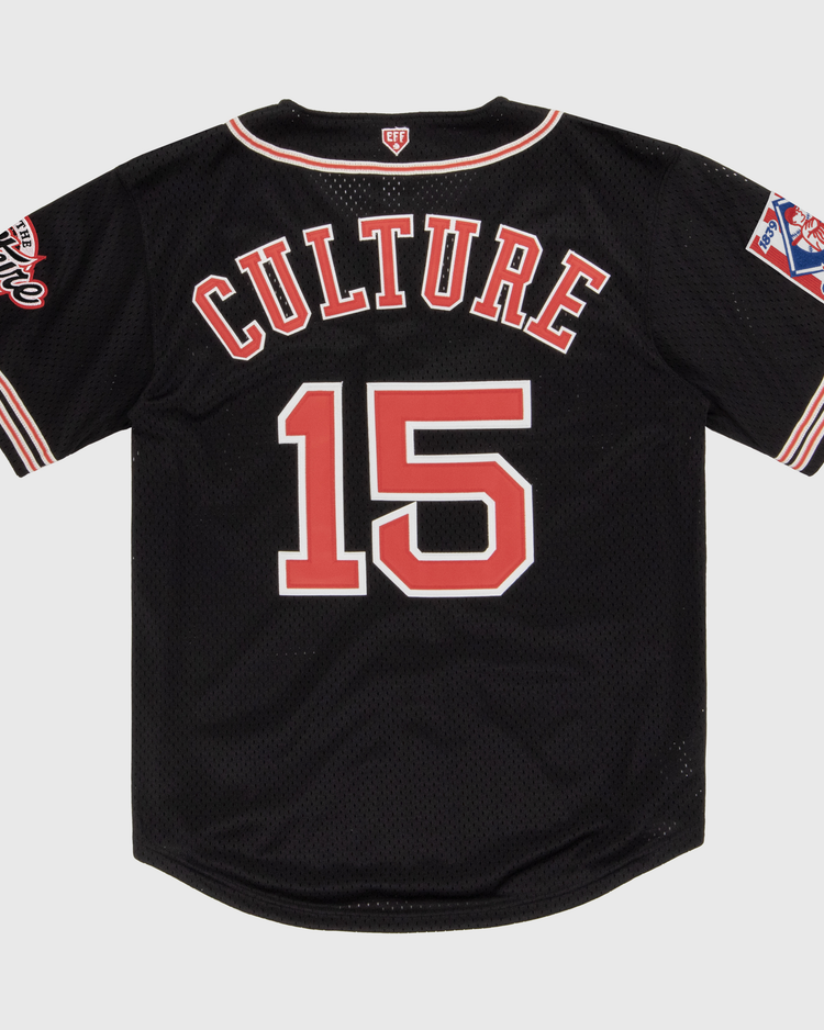 The EFF Cultural Excellence x Philadelphia Stars Button Down Jersey is a black baseball jersey with red and white trim, CULTURE and the number 15 on the back, plus sleeve patches for authentic flair inspired by Negro League streetwear.