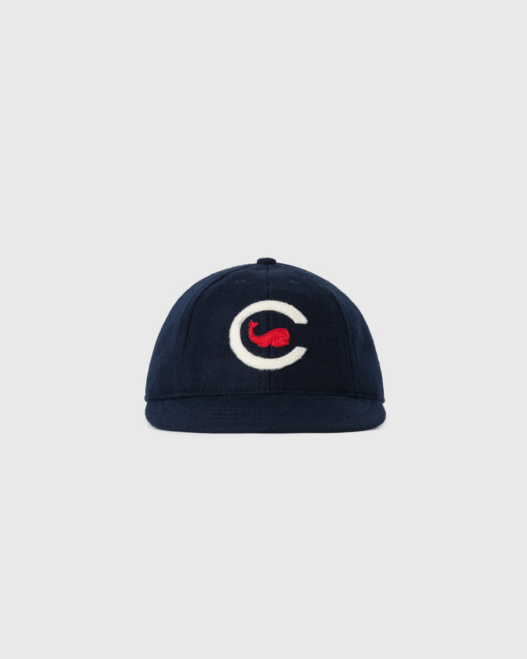 The EFF Chicago Whales 1915 Authentic 8-Panel Soft Short Brim Ballcap is a navy vintage wool cap with a white C and red design on the front, shown against a light gray background.