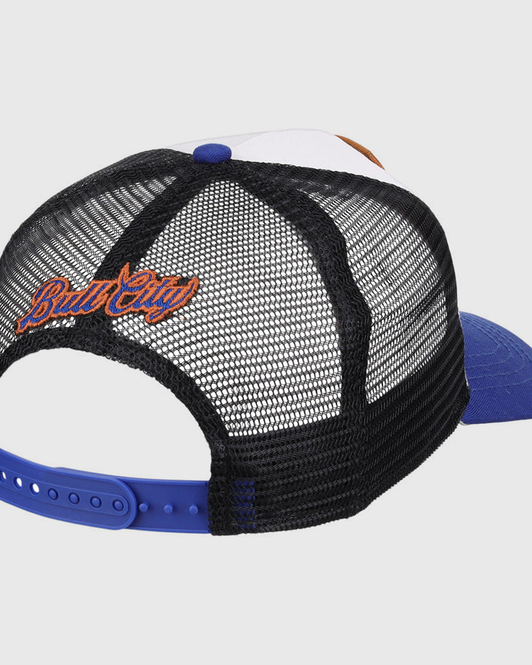 The Ebbets Field Durham Bulls MiLB Trucker Ballcap features a mesh-back, black and white crown, blue bill, and blue snap closure. “Bud City” is embroidered in orange and blue above the back opening.