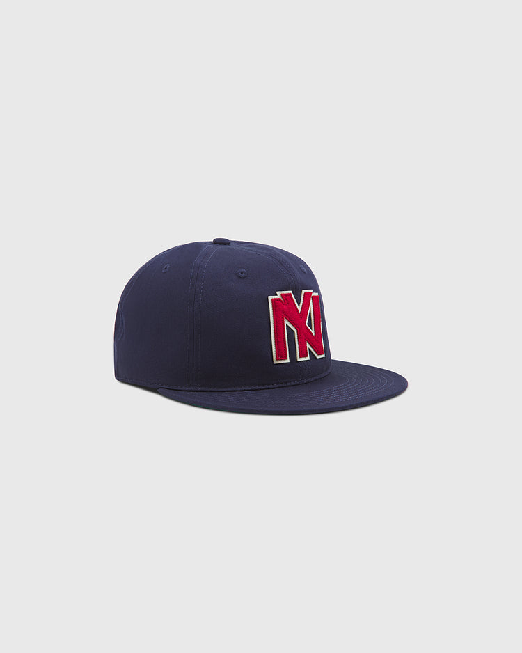 The Brooklyn Eagles Cotton Twill Ballcap by Ebbets Field, featuring a red and white “N” logo on the front, is shown against a plain light gray background.