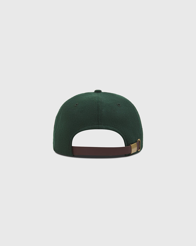 The NY Black Yankees Authentic Wool Ballcap by Ebbets Field is shown from the back in dark green wool, featuring a brown adjustable strap with a brass buckle, set against a plain light gray background—evoking the classic style of the New York Black Yankees and the historic Negro National League.