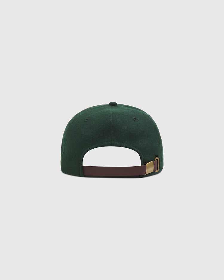 An Ebbets Field New York Cubans Authentic Wool Ballcap in dark green is displayed from the back, highlighting its brown adjustable strap with a brass buckle, set against a plain light gray background.