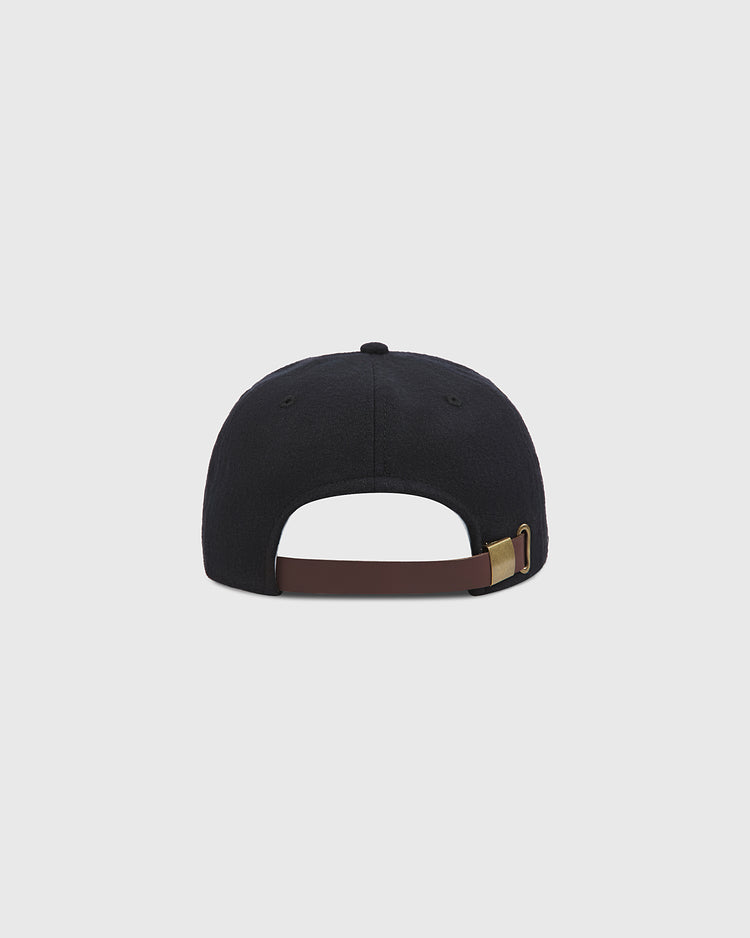 The Baltimore Elite Giants 1949 Authentic Wool Ballcap by Ebbets Field is shown from the back, highlighting its adjustable brown strap with a brass buckle. The background is plain and light gray.