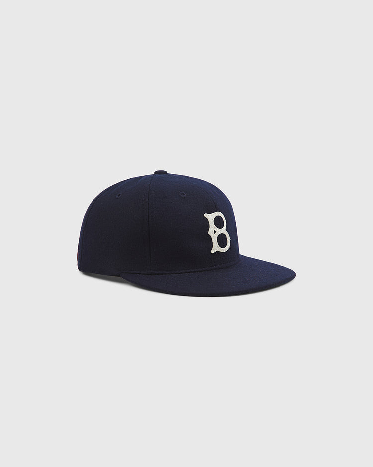 The Ebbets Field Brooklyn Royal Giants Authentic Wool Ballcap, featuring a white “B” logo on the front, is showcased against a plain light gray background.