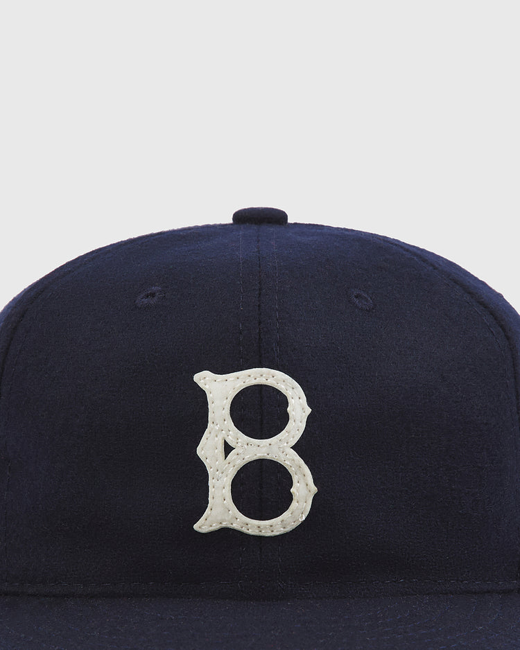 The Brooklyn Royal Giants Authentic Wool Ballcap by Ebbets Field, featuring a white letter B embroidered on the front, is displayed against a plain white background.