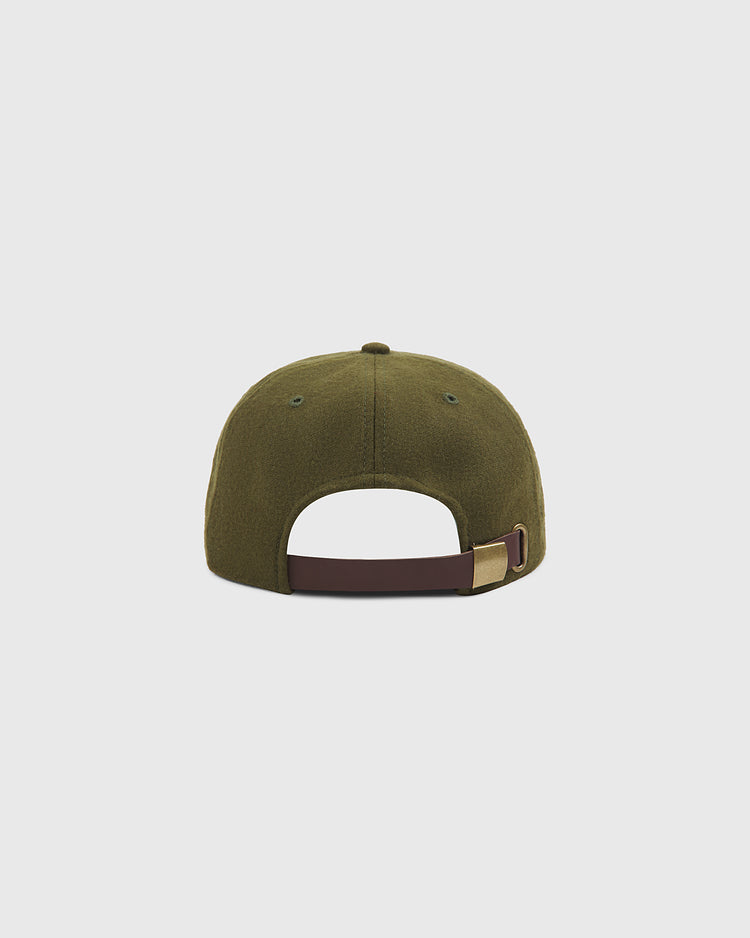 Ebbets Field’s Brooklyn Royal Giants Authentic Wool Ballcap in olive green is displayed from the back, highlighting its brown adjustable strap with a gold buckle against a plain light background—a contemporary homage to classic wool ballcaps inspired by Black baseball legends like the Brooklyn Royal Giants.