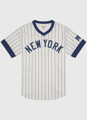 The Ebbets Field NY Black Yankees V-Neck Mesh Jersey features a white, short-sleeved design with navy blue pinstripes, bold “NEW YORK” lettering on the front, a navy blue collar and cuffs, and an N on the left sleeve—capturing the classic vintage style of the Negro National League’s NY Black Yankees.