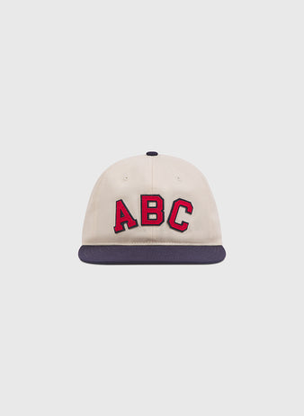 Atlanta Black Crackers 1940 Cotton Twill Ballcap in off-white cotton twill with a navy blue brim and red ABC lettering on the front.