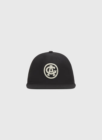 The Chicago American Giants 1927 Cotton Twill Ballcap by Ebbets Field is a black flat-brim cap with a white embroidered circular logo, shown on a plain light gray background.