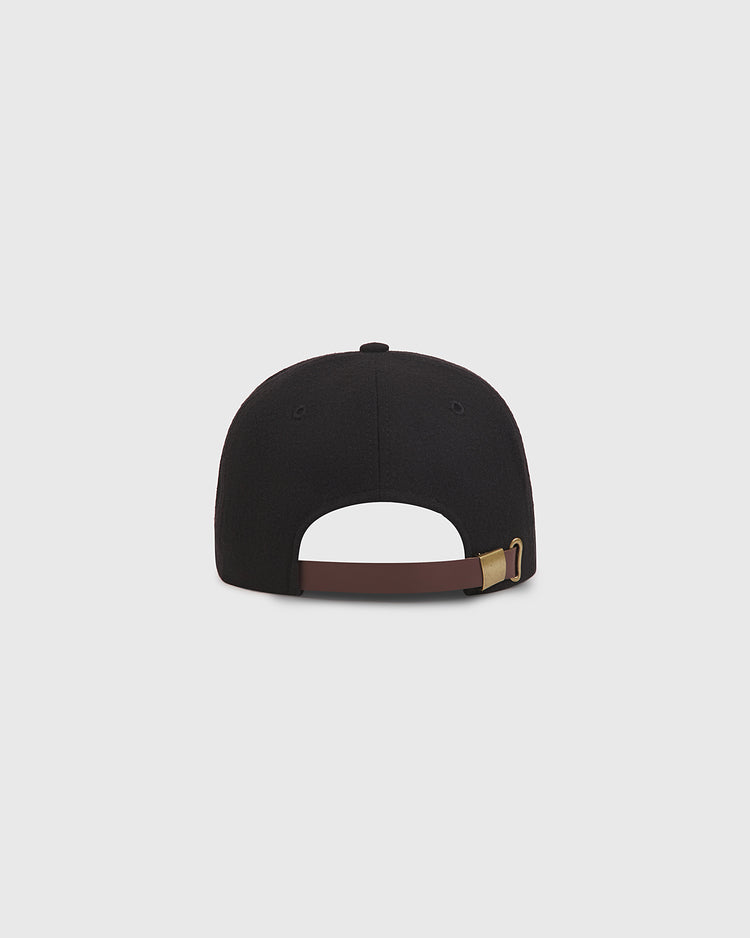 Back view of a black Kansas City Monarchs 1924 Authentic Wool Ballcap by Ebbets Field, featuring an adjustable brown leather strap and a gold metal buckle.