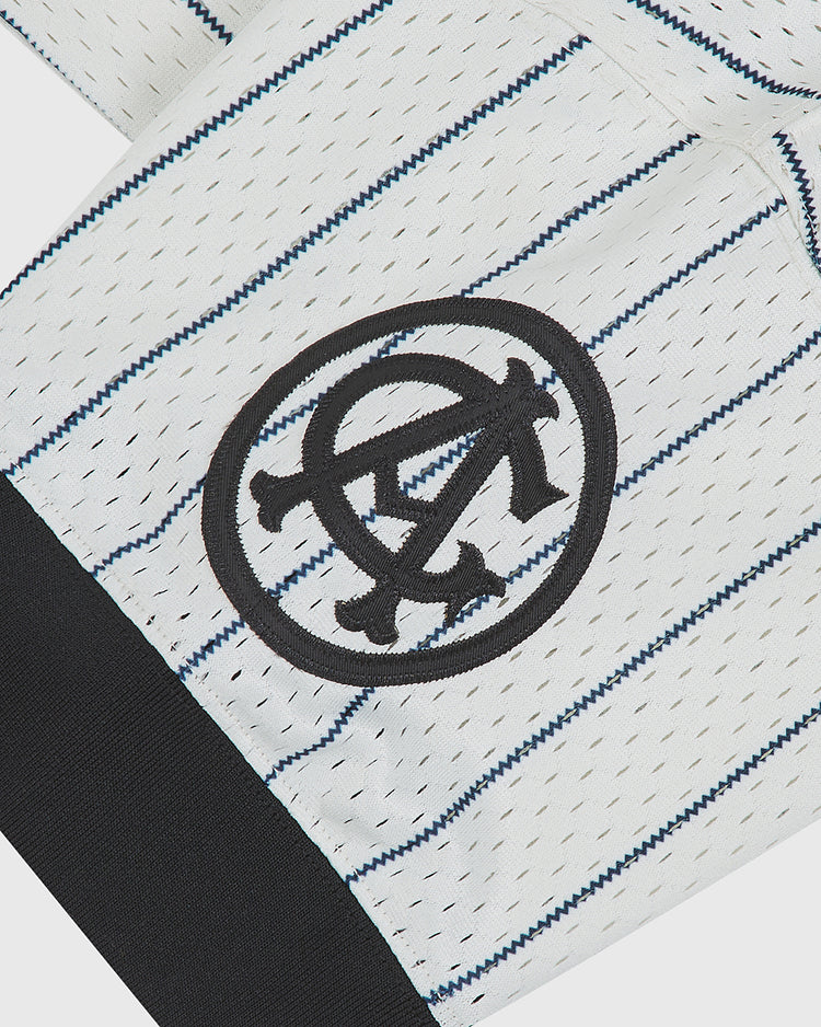 Ebbets Field Chicago American Giants 1927 V-Neck Mesh Jersey in white with navy blue pinstripes, featuring a black embroidered circular logo on the chest and a solid black ribbed hem.