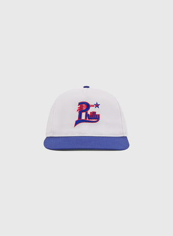 The Philadelphia Stars A-Frame Cotton Twill Ballcap by Ebbets Field is a retro white baseball hat featuring a blue brim and an embroidered red, blue, and white 