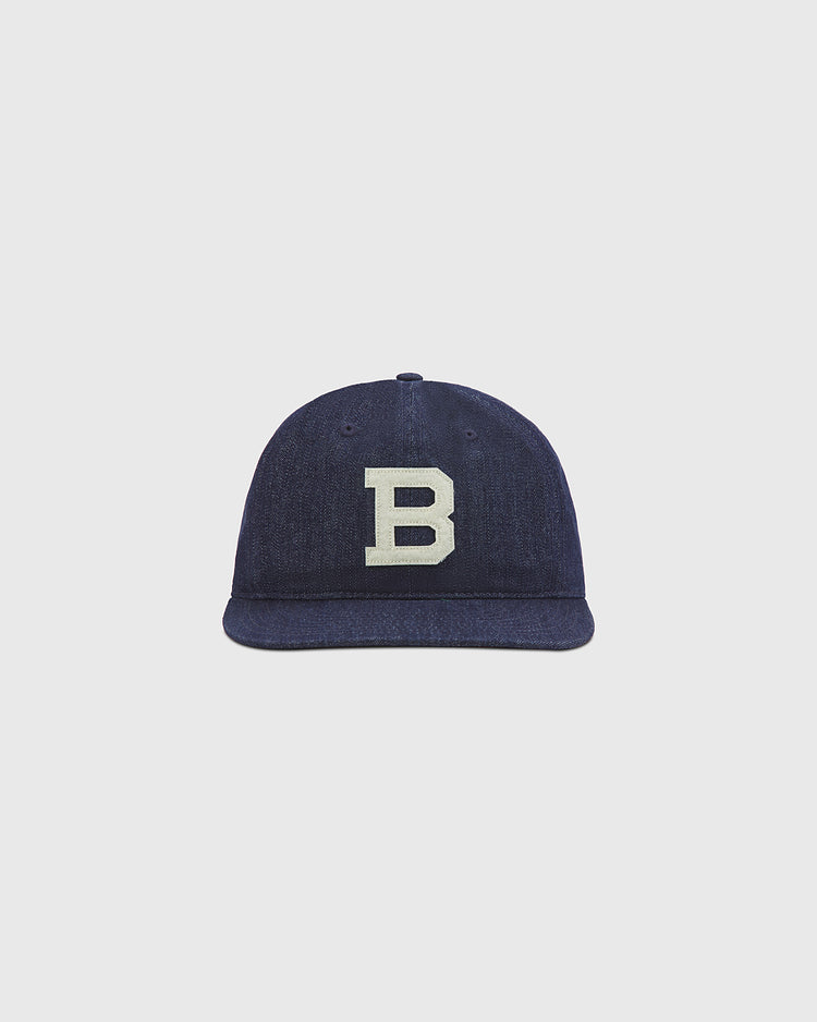 An Ebbets Field Brooklyn Bushwicks Indigo Cotton Denim Ballcap, featuring a flat brim and a large white embroidered 