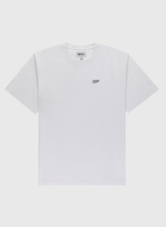The Ebbets Chest Logo Short Sleeve Tee by Ebbets Field Flannels is a durable cotton white t-shirt featuring a small black embroidered chest logo, shown on a light gray background—a timeless wardrobe staple.