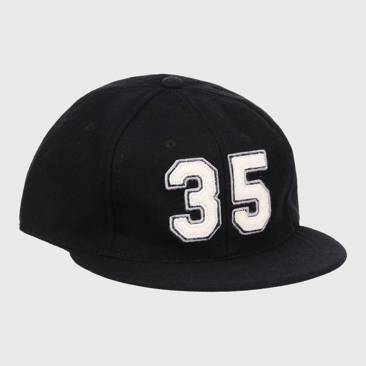 The Frank Thomas Signature Series Ballcap by Ebbets Field Flannels is a black vintage wool cap with a bold white 35 on the front—ideal for National Baseball Hall of Fame fans.