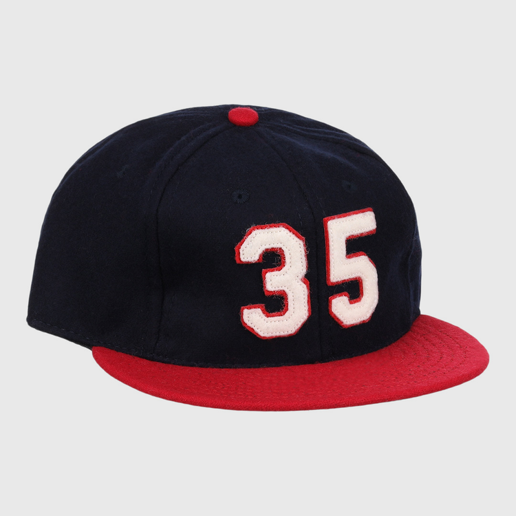 The Ebbets Field Flannels Frank Thomas Signature Series Ballcap – Navy features vintage wool, a red brim and button, and white “35” with red trim on the front, honoring Chicago White Sox legend Frank Thomas.
