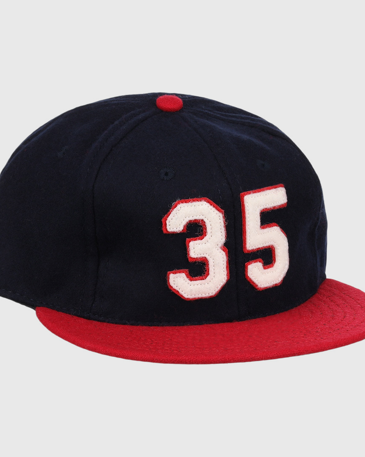 The Ebbets Field Flannels Frank Thomas Signature Series Ballcap – Navy features vintage wool, a red brim and button, and white “35” with red trim on the front, honoring Chicago White Sox legend Frank Thomas.
