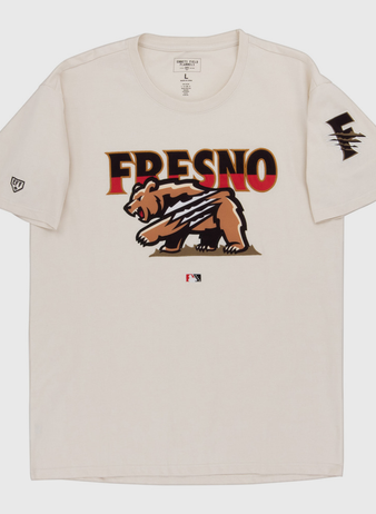 The Ebbets Field Fresno Grizzlies MiLB Fashion Cotton Short Sleeve Tee is a beige shirt with a bear graphic and claw marks, 