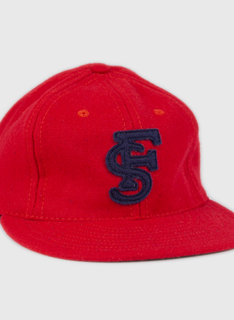 The Fresno State University 1951 Vintage Ballcap by Ebbets Field Flannels features a red flat brim and a navy blue embroidered FS logo, displayed against a white background.
