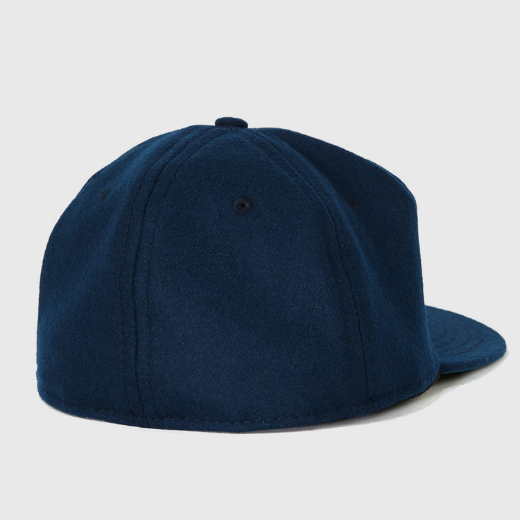 The EFF Gonzaga University 1971 Vintage Ballcap is a navy blue classic with a flat brim, shown from the back with no visible logo or adjustable strap—a true throwback style reproduction.