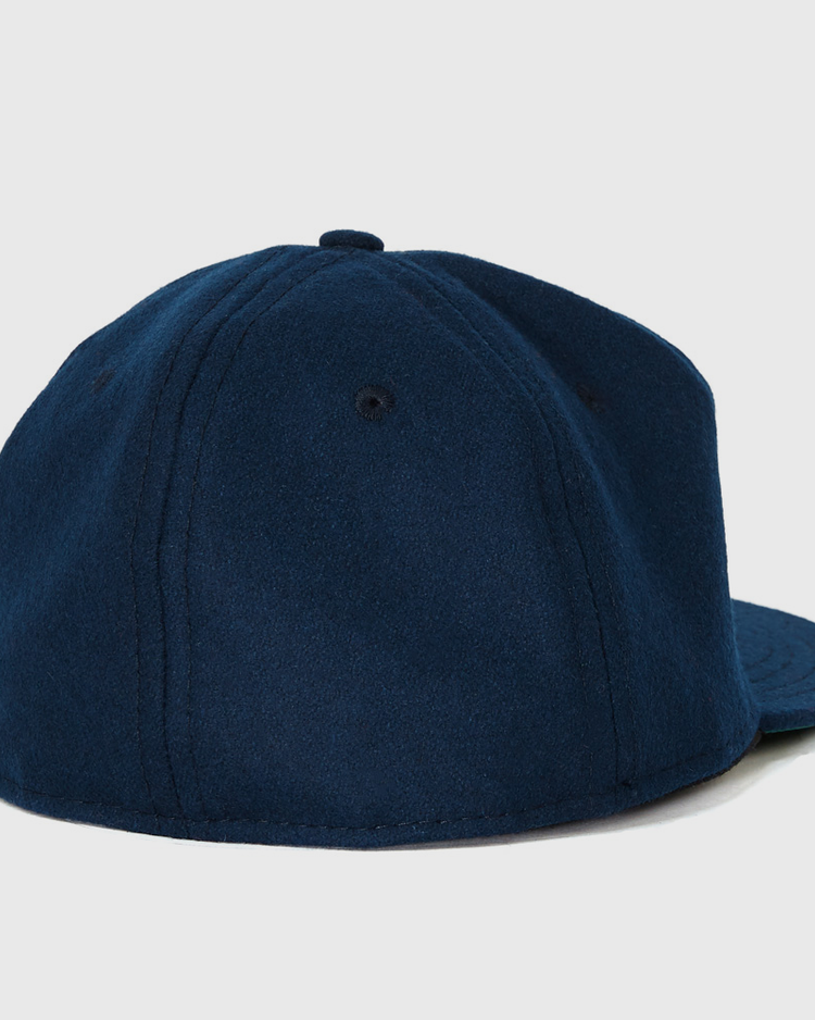 The EFF Gonzaga University 1971 Vintage Ballcap is a navy blue classic with a flat brim, shown from the back with no visible logo or adjustable strap—a true throwback style reproduction.