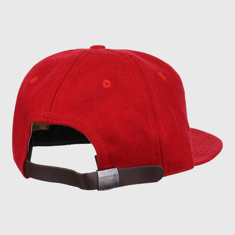 The EFF Greensboro Patriots 1922 Vintage Ballcap in red is shown from the back, highlighting its brown adjustable strap and silver buckle.
