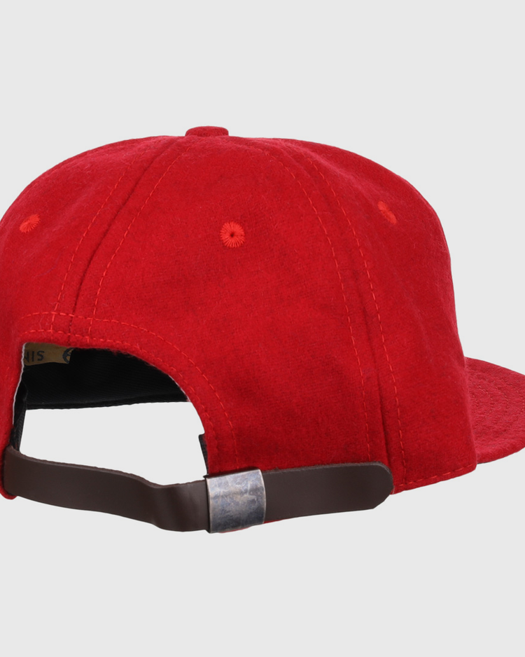 The EFF Greensboro Patriots 1922 Vintage Ballcap in red is shown from the back, highlighting its brown adjustable strap and silver buckle.